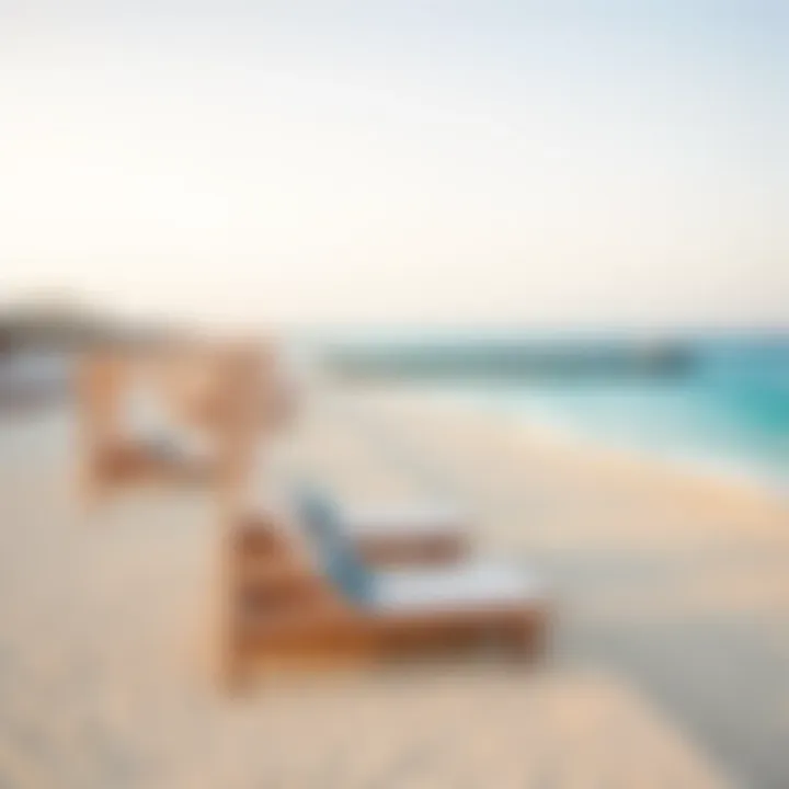 Stunning beachfront in Dubai with sun loungers and clear blue waters.