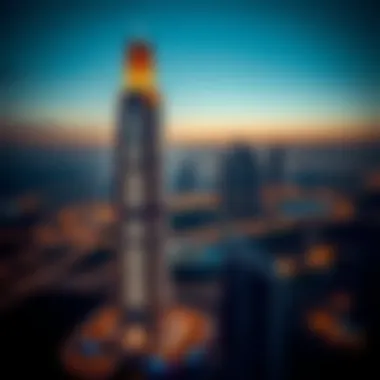 Evening skyline featuring Eywa Tower illuminated against the Dubai backdrop