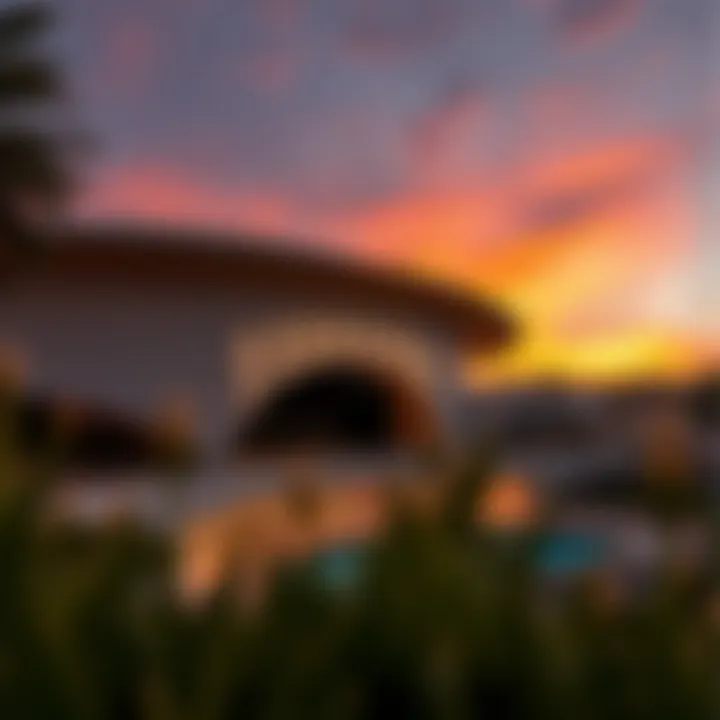 Architectural Marvel of the Open Theatre A breathtaking view of the Open Theatre showcasing its modern architectural design against a sunset backdrop