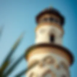 A stunning view of a traditional wind tower in Dubai against a clear blue sky
