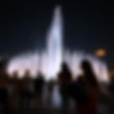 Daytime Fountain Performance Visitors enjoying a daytime show of the Dubai Fountain